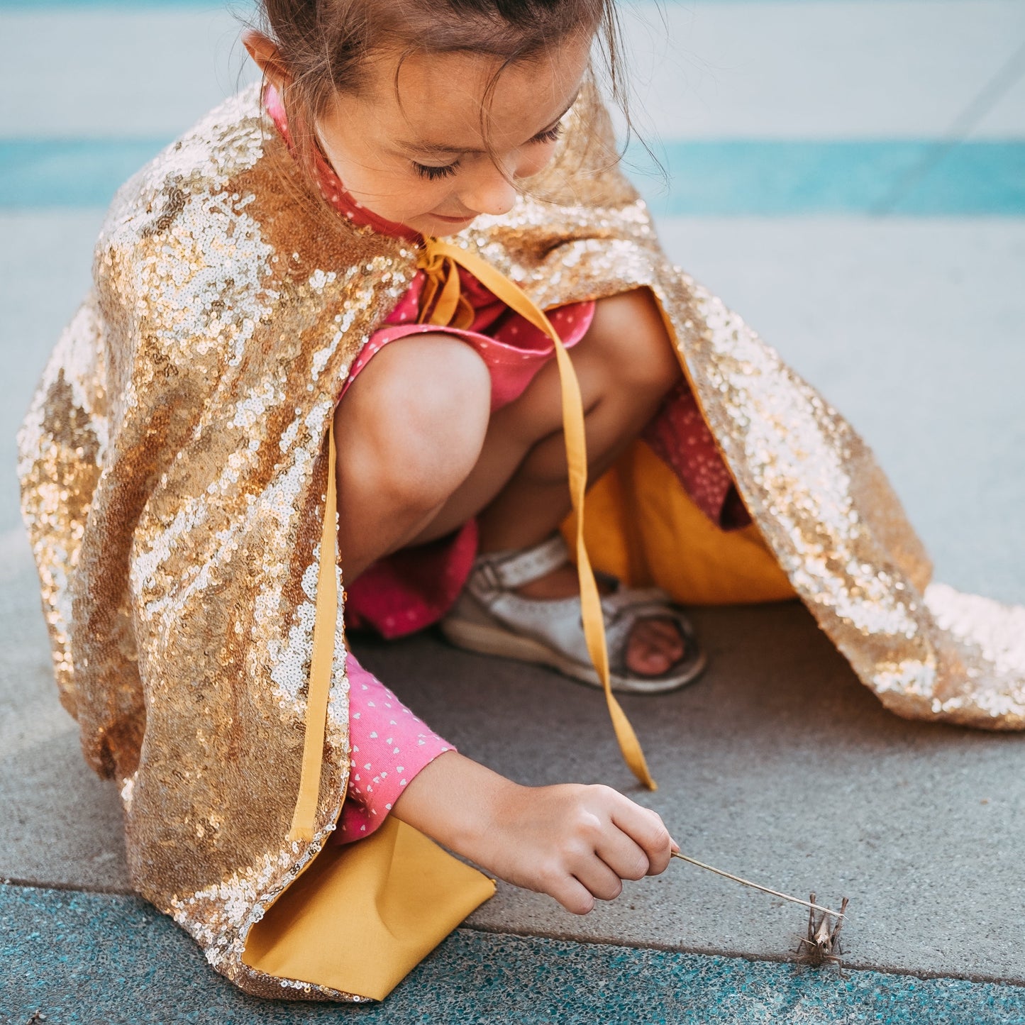 Gold sequin cape