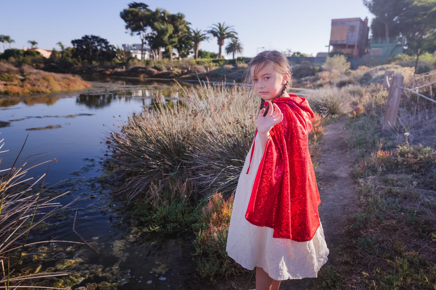 Red sequin cape with a hood