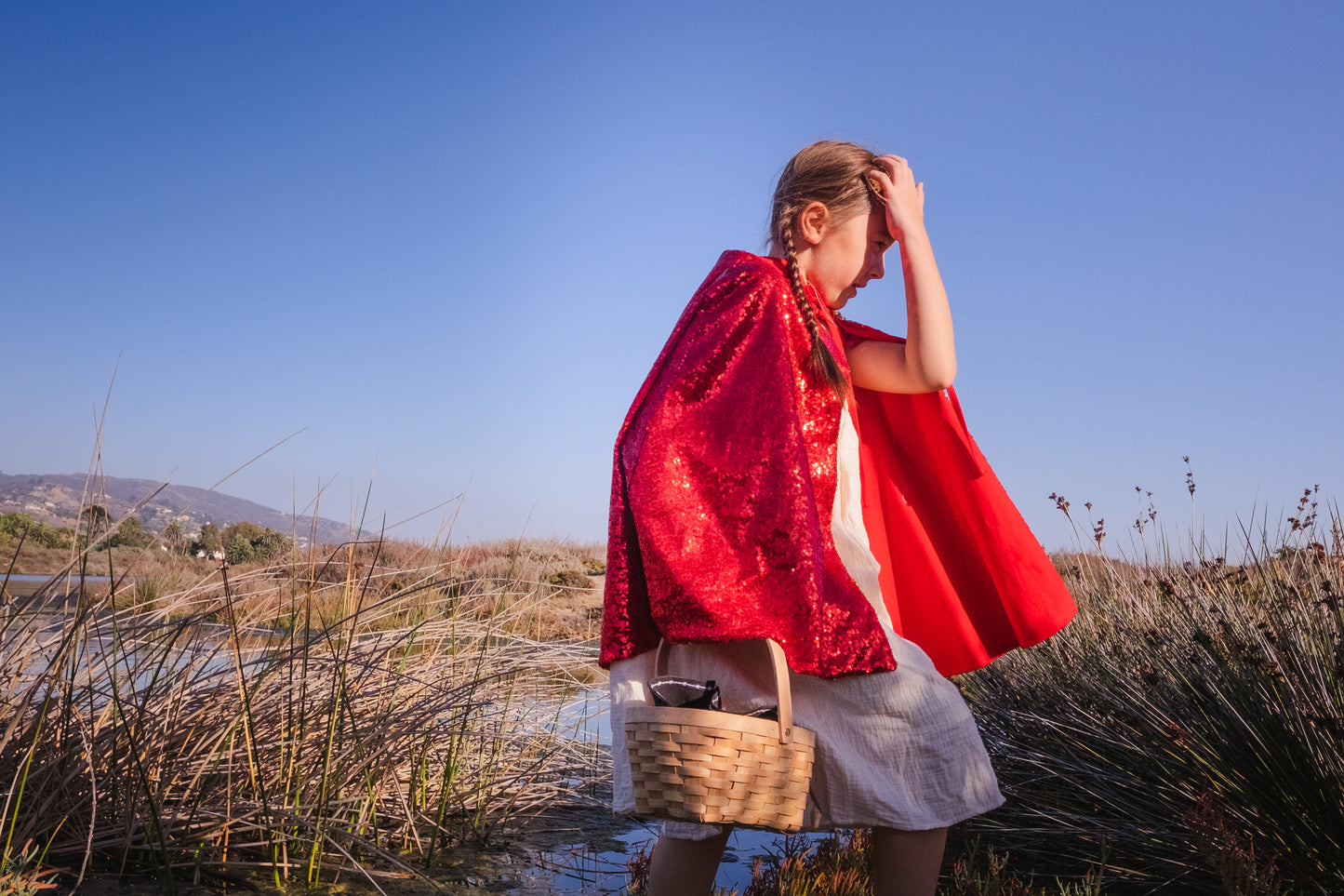 Red sequin cape with a hood