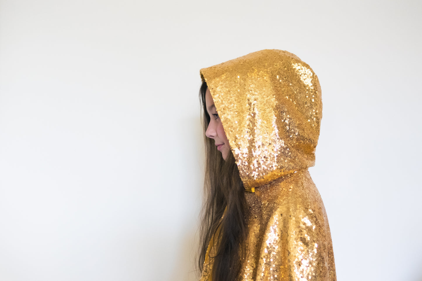 Gold sequin cape with a hood