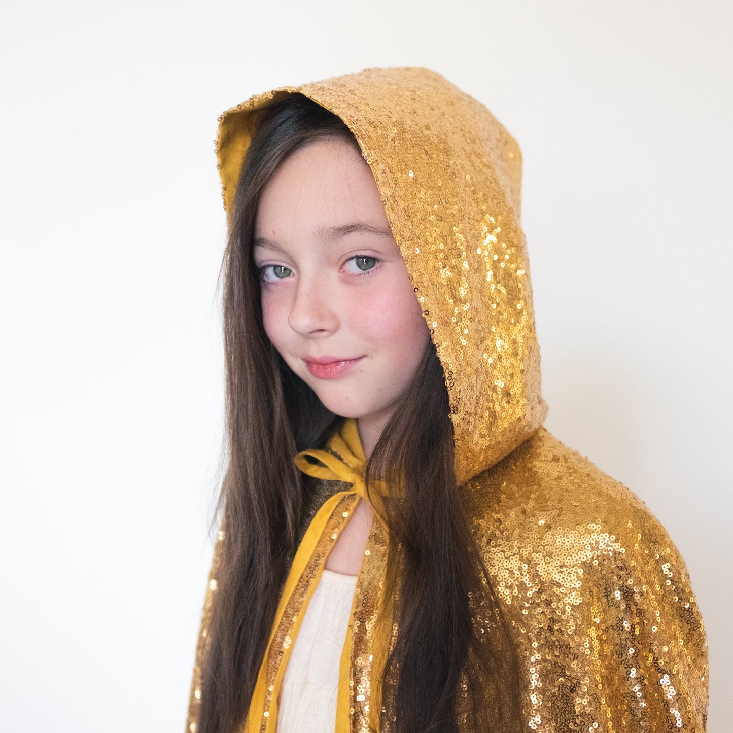 Gold sequin cape with a hood