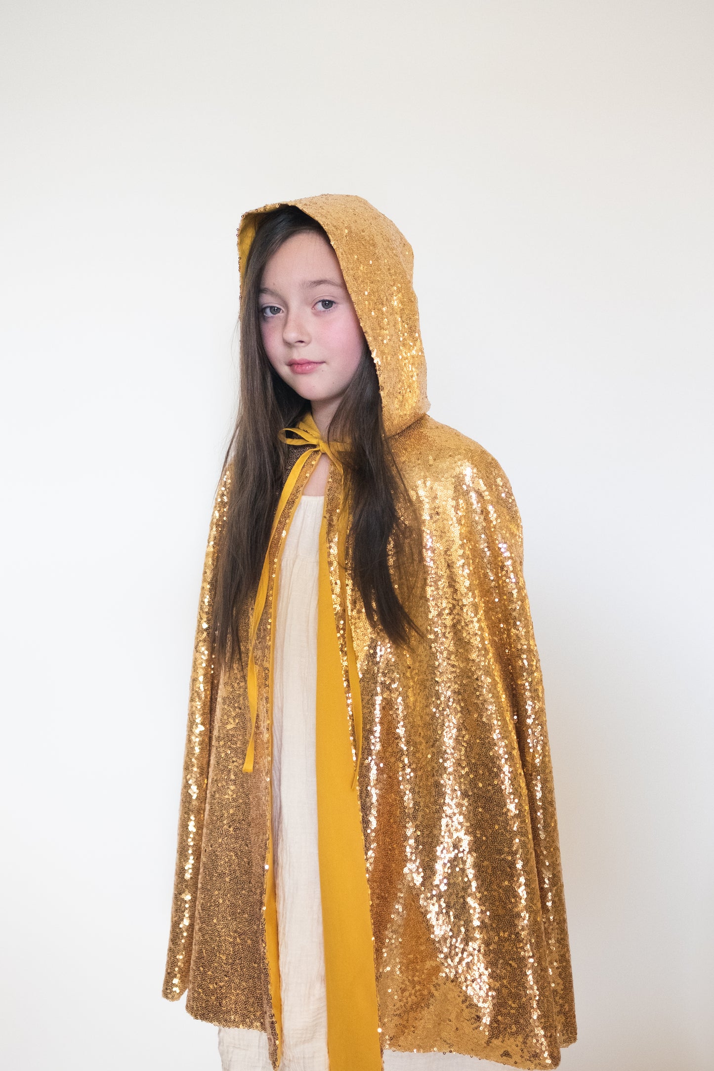 Gold sequin cape with a hood